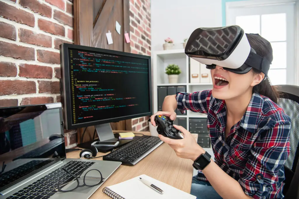 wearing virtual reality goggles and playing game