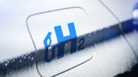 car-with-hydrogen-logo-on-filler-cap-h2-combustion-engine-for-e