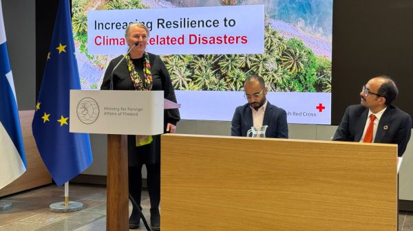 Leena Klossner speaking at a MFA - Red Cross event